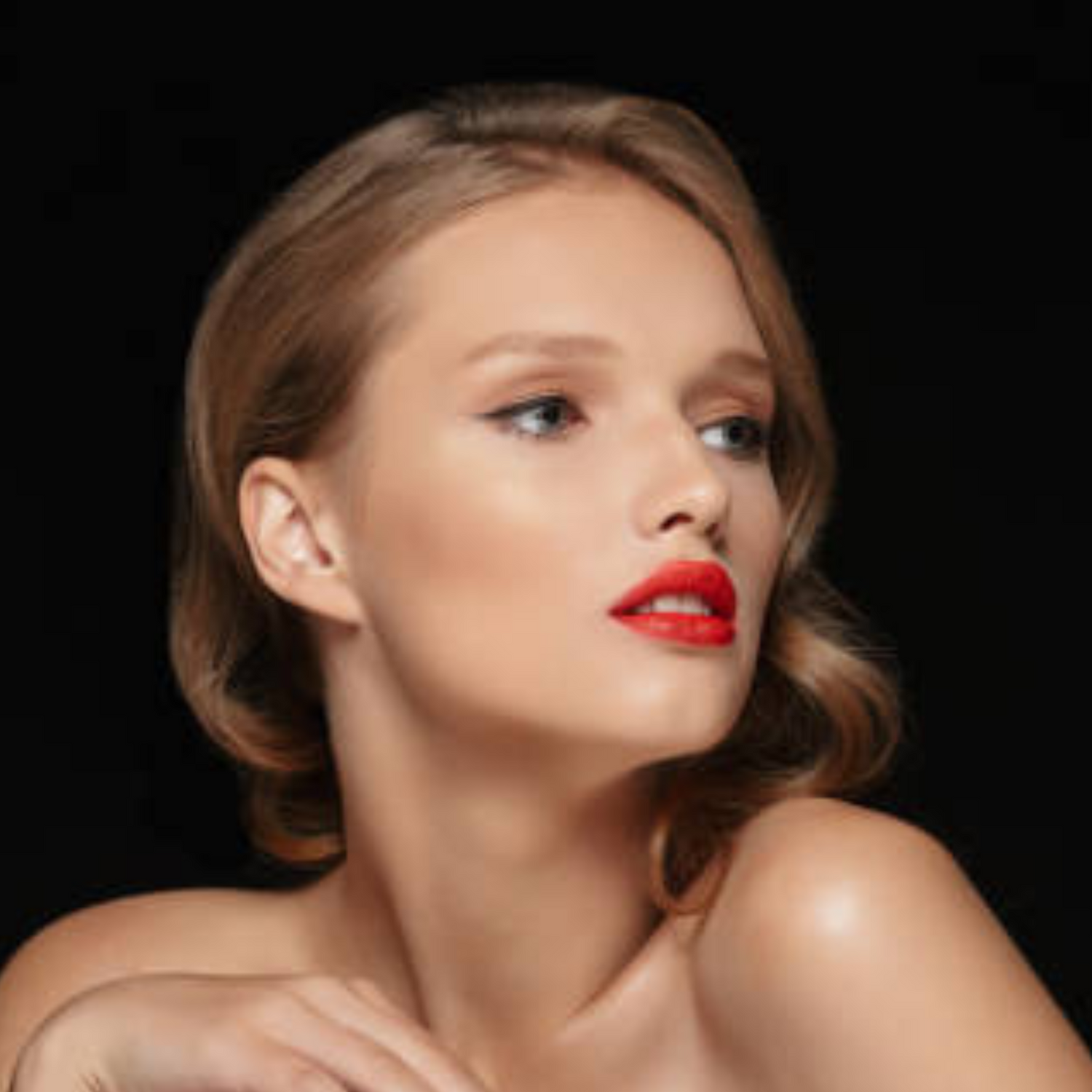 woman wearing red matte lipstick