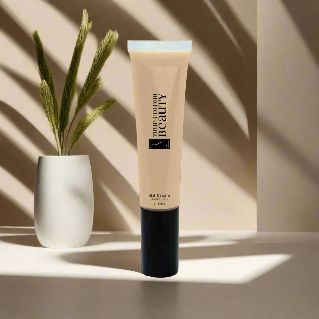 BB Cream - Terra Cotta tube beside a potted plant, highlighting its eco-friendly, multifunctional design for skin protection and hydration from True Colour Beauty.