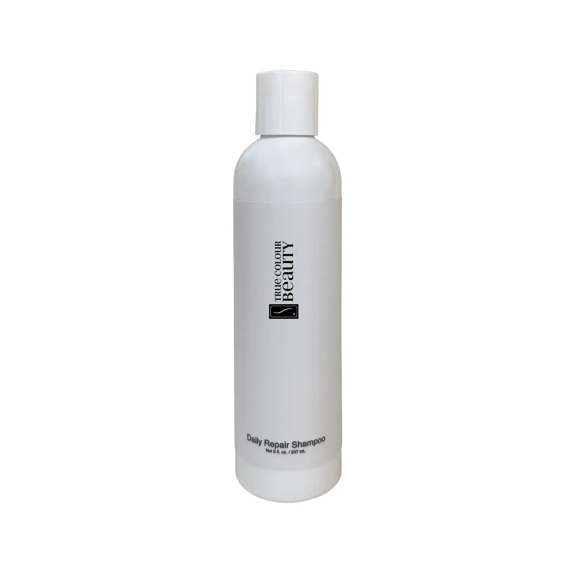 Bottle of TCB Daily Repair Shampoo, designed to gently cleanse and hydrate all types of hair for healthy hair.