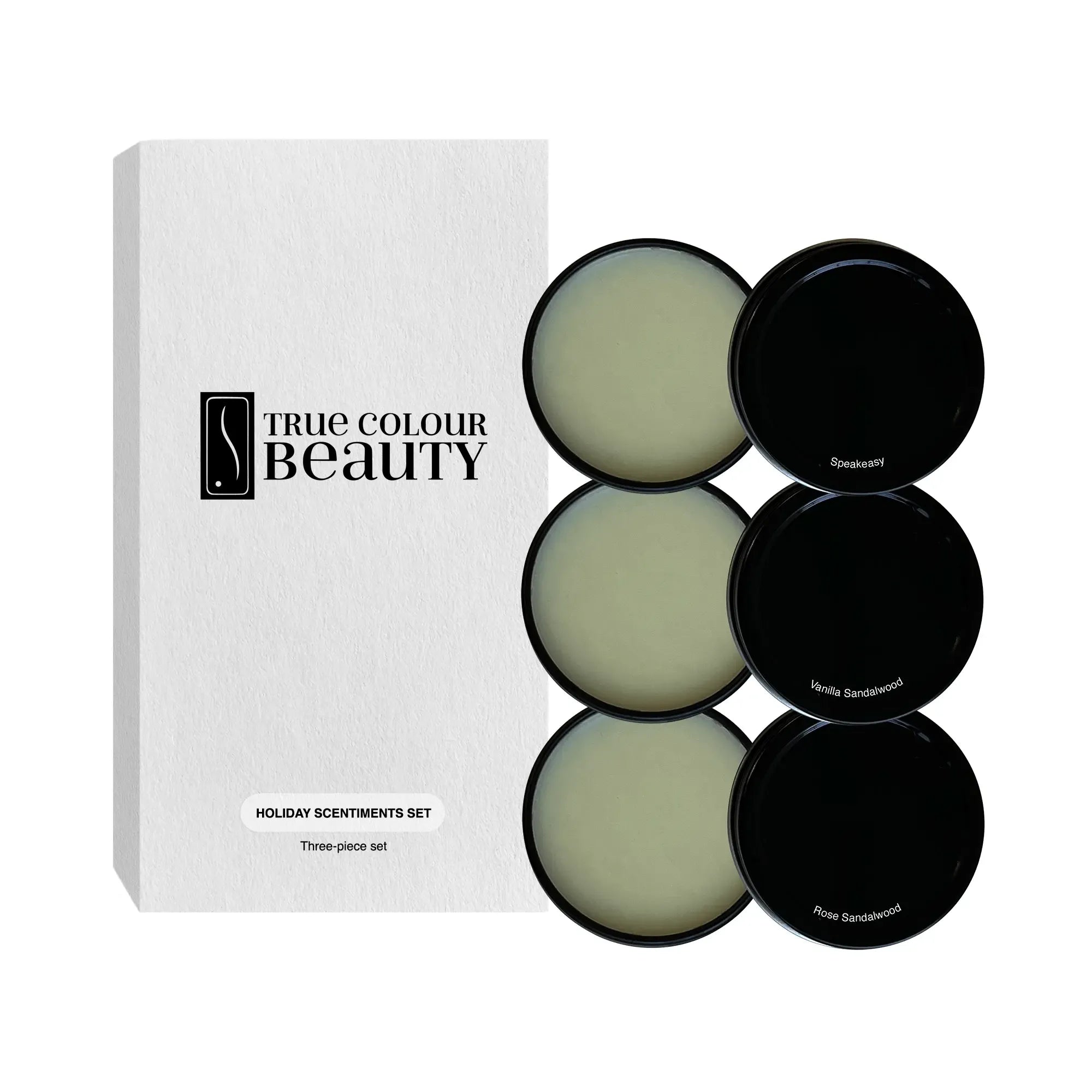 Men's Holiday Scentiments Set in black tins, featuring three solid fragrances: Speakeasy, Vanilla Sandalwood, and Rose Sandalwood, elegantly displayed in a group.