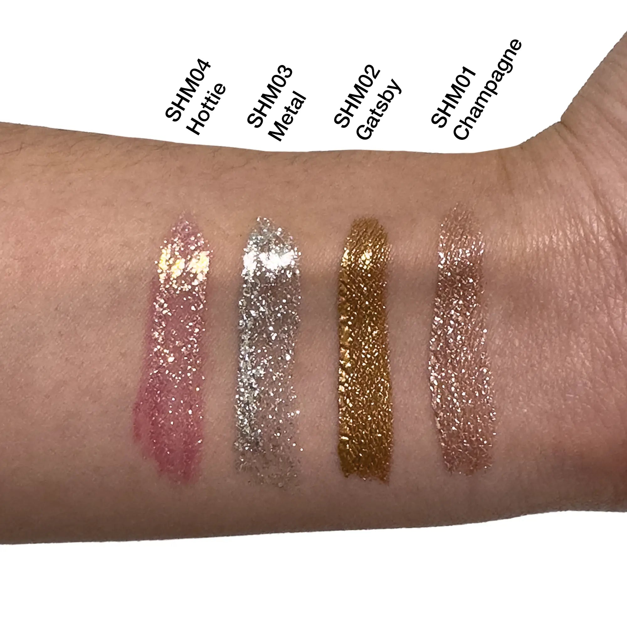 True Coulor Glitz & Glamor Set features glitter swatches on a wrist, showcasing the product's radiant shimmer effect for a luminous finish.