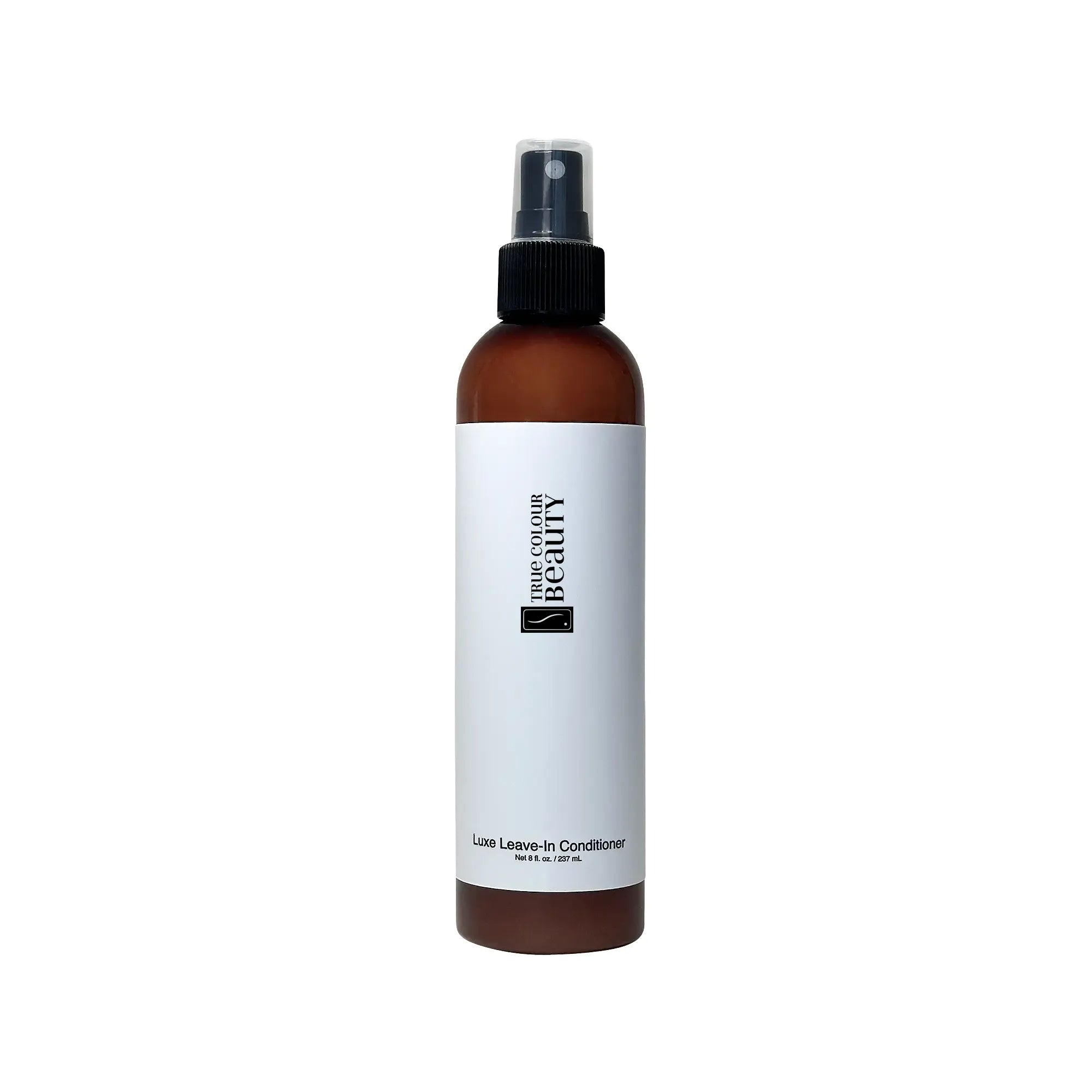 Bottle of TCB Leave-In Conditioner, designed to provide moisture and nourishment for soft, manageable hair