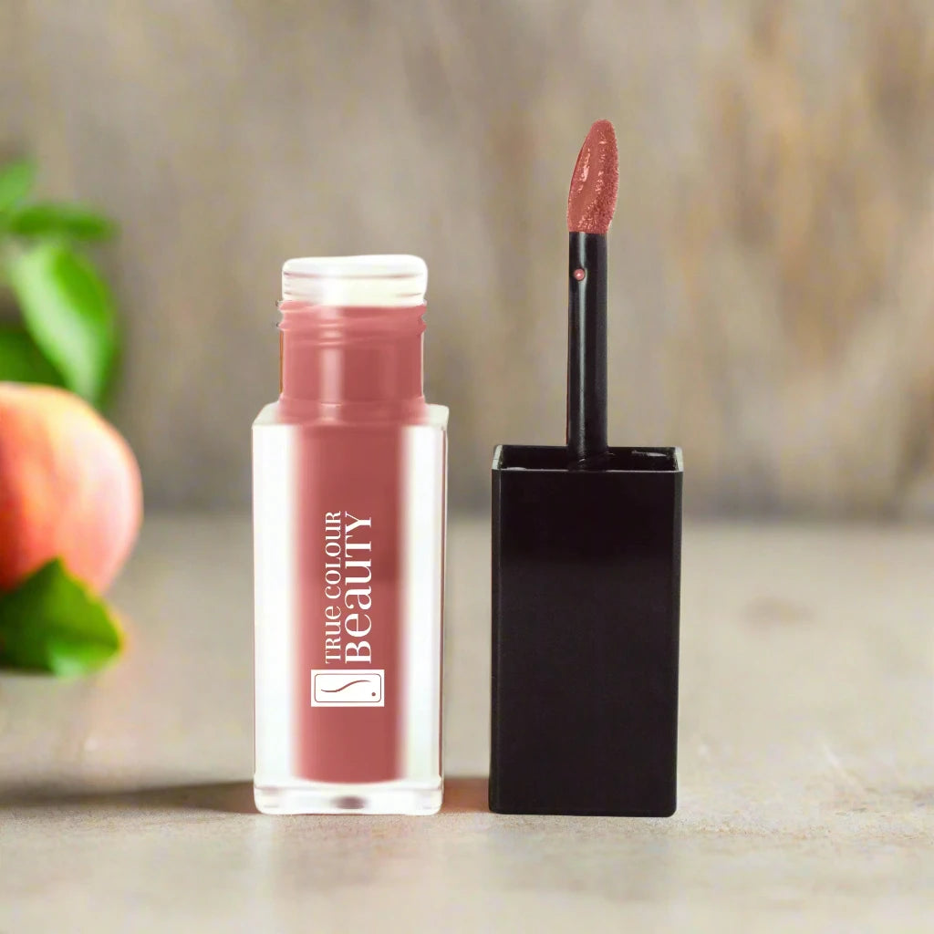 True Colour Beauty Matte Liquid Lip Stain in Pink Peach, showcasing a soft and vibrant pink-peach shade for a fresh, youthful lip look