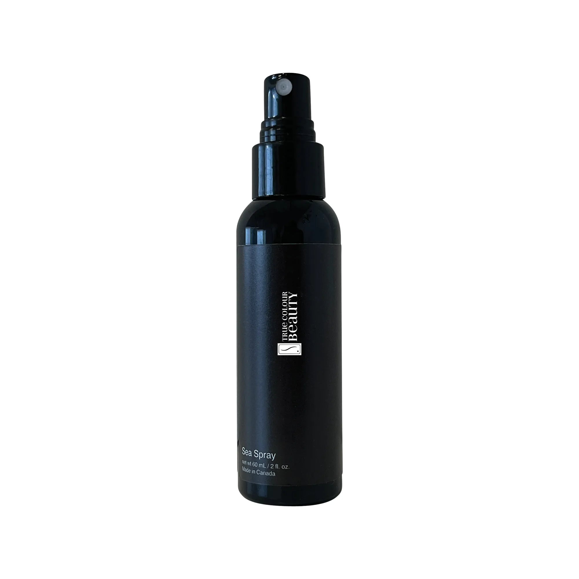 Bottle of TCB Water-Based Sea Spray, designed to add texture and volume for a natural, beachy look.