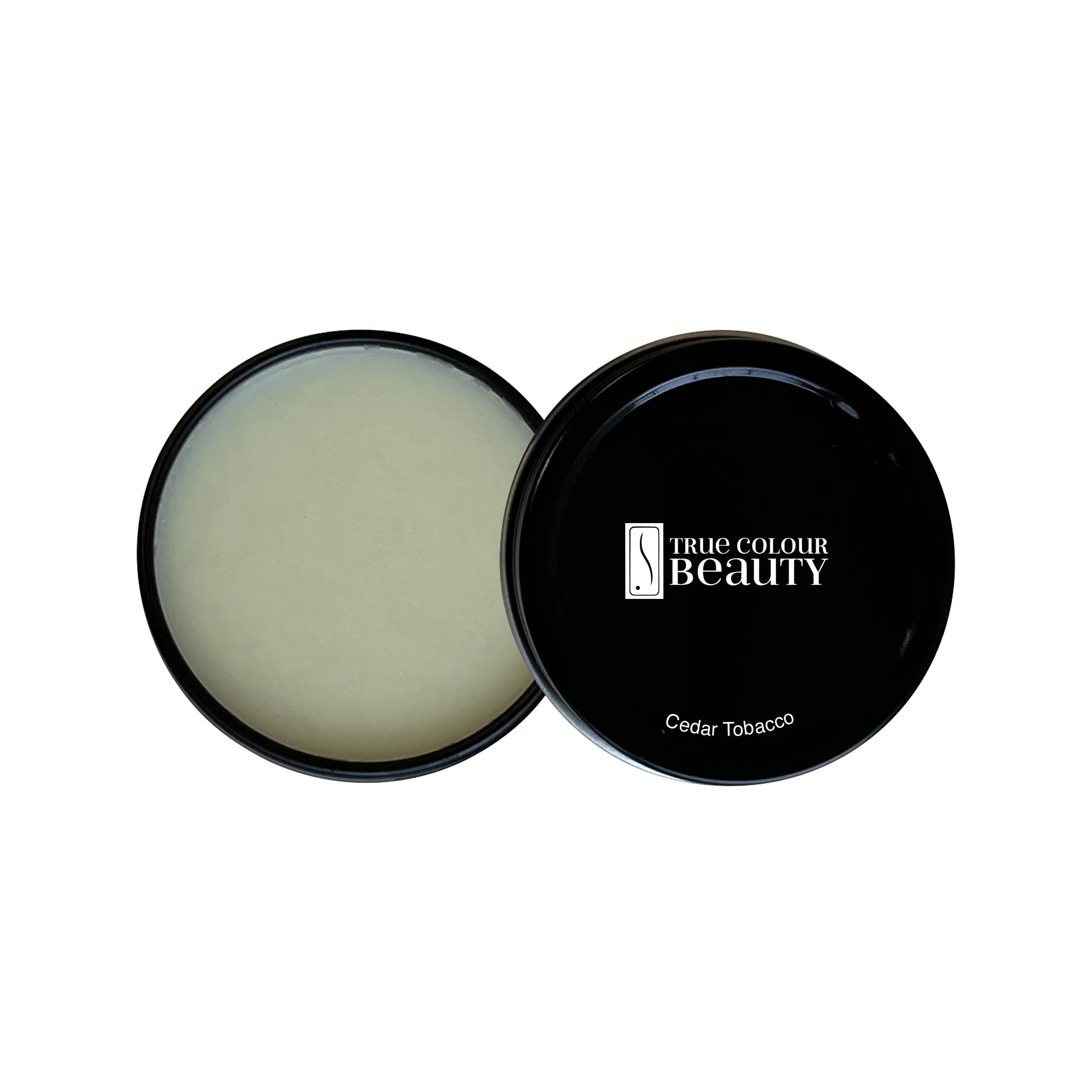 Solid Fragrance - Cedar Tobacco in a black container with a white lid, designed for easy application and portability, featuring vegan, natural ingredients.