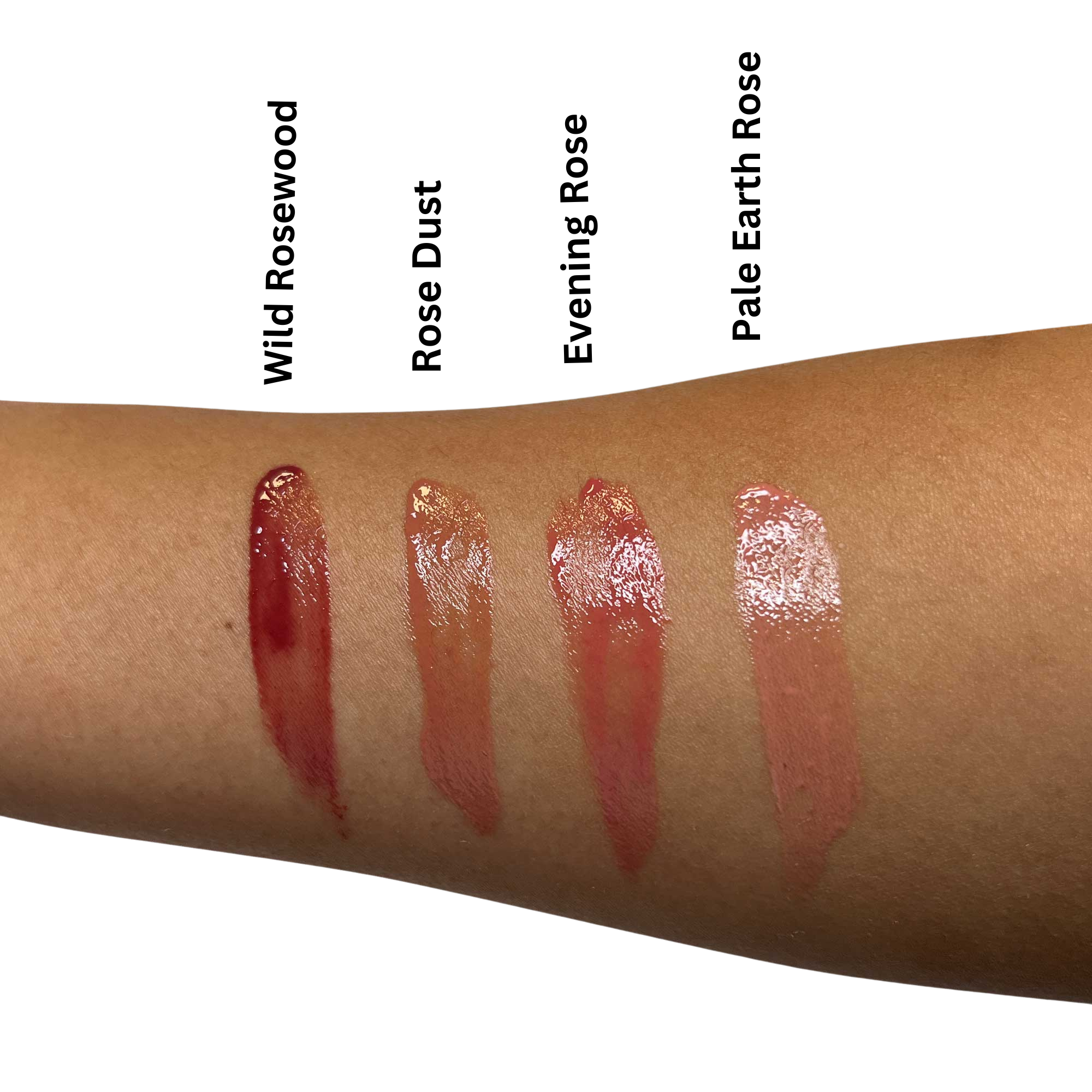 True Coulor Glitz & Glamor Set displayed on an arm, showcasing lipstick samples. Includes Lip Oil, Liquid Blush, and Liquid Shimmer for a luminous makeup finish.